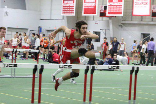 ZACH CONLON, a senior, captured first place in the 55 meter hurdles and did so with a PR time of 9.35 seconds. (Donna Larsson File Photo)