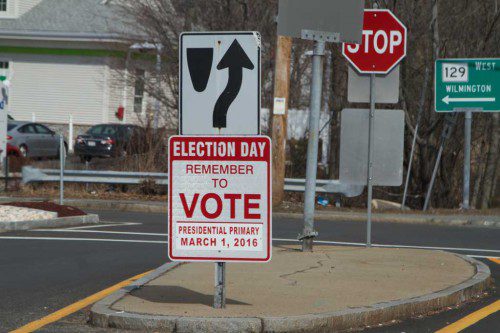 SIGNS such as this one have been placed around town to remind local residents to vote in the Presidential Primary on Tuesday, March 1. Polls are open from 7 a.m. to 8 p.m. (Donna Larsson Photo)