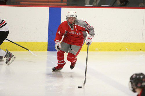 SENIOR CAPTAIN Julianne Bourque scored two goals and assisted on another in Wakefield’s 7-4 setback in the Middlesex League Freedom division finale yesterday afternoon at the Stoneham Arena. (Donna Larsson File Photo)