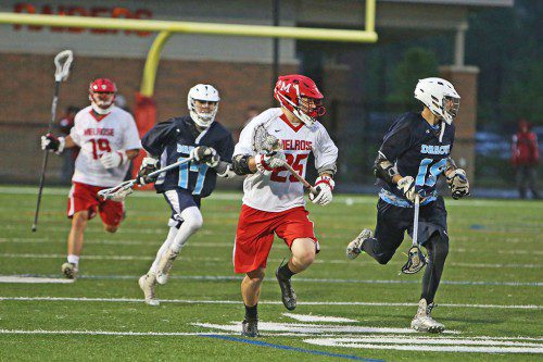 THE MELROSE High boys' lacrosse team hits the turf after another successful season, looking to return once again to Div. 2 playoffs. Pictured is senior captain Cameron Hickey. (file photo) 