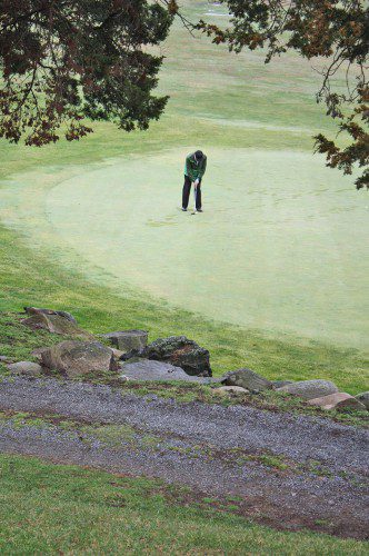 THIS GOLFER putts at the Reedy Meadow Golf Course last week. Local golfers will be able to hit the links at either King Rail Reserve Golf Course or Reedy Meadow Friday. (Dan Tomasello Photo)