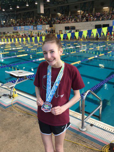 ELLIE WALSH of Melrose swam with the best in the nation when she competed at the  2016 Jr. National Showcase Cup held in Clearwater, FL. The rising star medaled in four events. (courtesy photo) 
