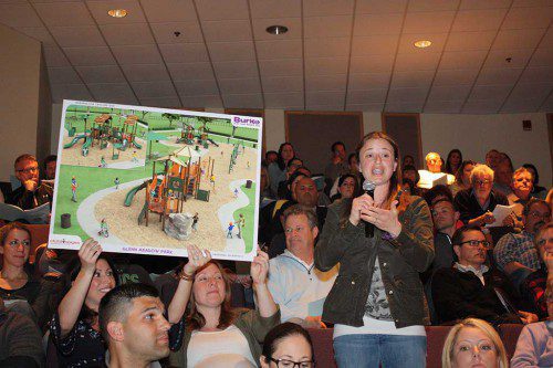 LYNNFIELD Moms Group member Melissa Adams presents a rendering of the proposed new playground structure for Glen Meadow Park. Their group has raised nearly $40,000 for it while Town Meeting approved $200,000 to put toward town playgrounds. (Maureen Doherty Photo)