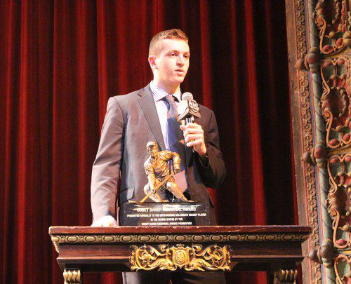 HARVARD SENIOR JIM VESEY, from North Reading, accepts the Hobey Baker Memorial Award in a ceremony in Tampa last Friday. (Melissa Doherty Brennan Photo)