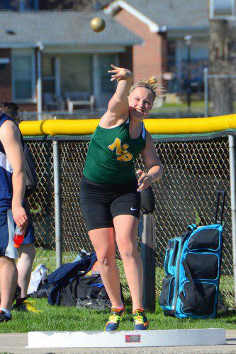 HORNET SENIOR Liz Carlson helped North Reading complete the sweep of Hamilton–Wenham in the shot put with a heave of 28 ft., 10 in. (John Friberg Photo)