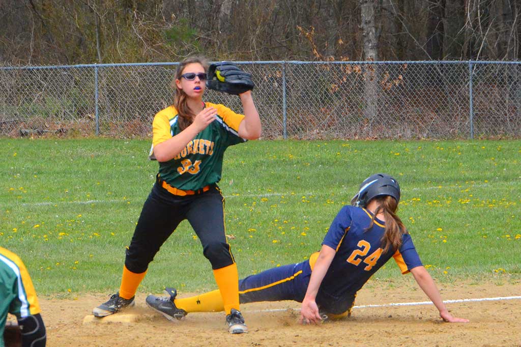 THIRD BASEMAN Guiliana Peppe (33) takes a throw from Lily Malloy to force a runner at the bag. The team’s record is now 7–1, good for first place in the CAL Kinney Division. (John Friberg Photo)
