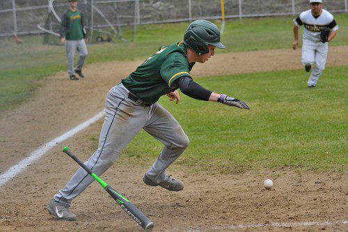 SENIOR FIRST BASEMAN Sean Castro lays down the bunt and beats the throw to first against Northeast Metro. The Hornets improved to 12-0 with the 2-0 win against the Knights. (Courtesy Photo)