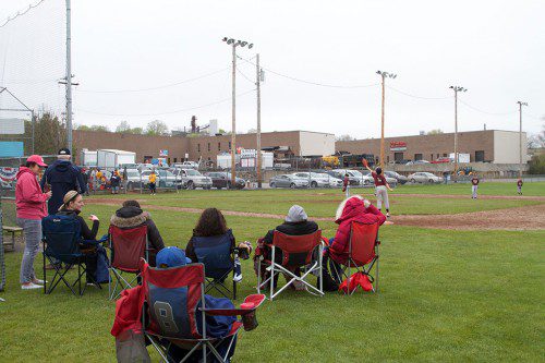WATCHING LITTLE LEAGUE at Nasella Park recently was not for fair weather fans. (Donna Larsson Photo)
