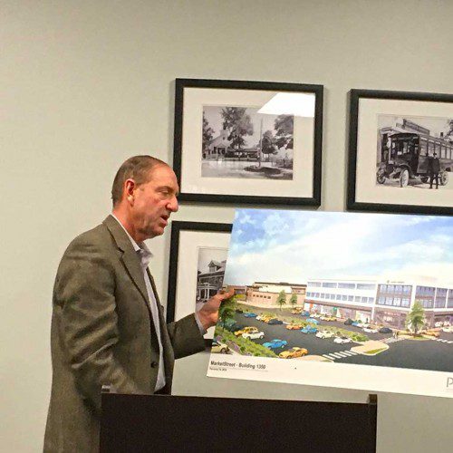 NATIONAL DEVELOPMENT Managing Partner Ted Tye shows a rendering of the proposed three-story, 42-foot high medical office building for MarketStreet Lynnfield during the Planning Board’s meeting Feb. 14. (Dan Tomasello Photo)
