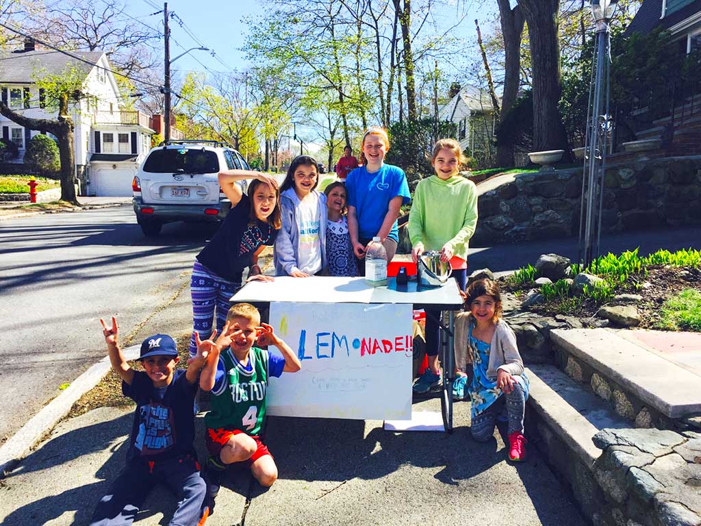 ANDREW McNEILLY saw kids outside playing together and knew spring was in the air. This is a Hoover School neighborhood lemonade stand put up last weekend. Several children had a great time celebrating the beginning of spring by having a lemonade stand on Birch Hill Avenue.