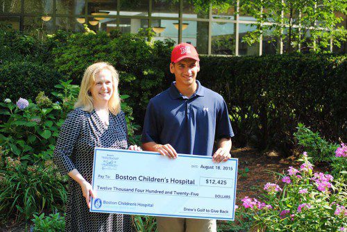 LOCAL HERO. Melrose High School senior Drew Maguire has spent three years raising funds for the The Bone and Soft Tissue Tumor program at Boston Children’s Hospital, amassing almost $50,000 in the process. It is a cause near and dear to the senior captain of the MHS baseball and golf teams. He is pictured with the collection of checks written over the years, and his treating physician, Dr. Megan Anderson.  (courtesy photos) 