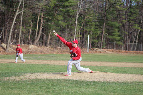BEN COCCOLUTO, a senior, pitched five and a third innings in a classic pitchers duel yesterday against Stoneham. Even though he wasn’t involved in the decision, the Warriors won the contest by a 2-1 score. (Keith Curtis File Photo)