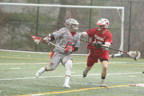 ANTHONY FORZIATI, a sophmore (#6), notched four goals to lead the Warrior boys’ lacrosse team to a 13-9 triumph over fourth-ranked Reading yesterday afternoon at Landrigan Field. (Donna Larsson Photo)
