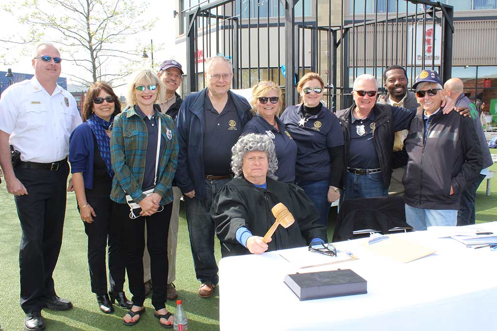 LYNNFIELD ROTARY presented its first annual Jail and Bail fundraiser on May 4, which raised funds for Reid’s Ride. Sitting is Judge Jay Kimball. Back row, from left, Police Chief David Breen, Lorraine Sacco, Lisa Pappas, Victor Saldanha, Ron Block,  Patti Nardone, Paula Parziale, Dick Dalton, Tes Mercedat and Dave Drislane. Missing from photo is Bob Priestley.  (Dan Tomasello Photo)