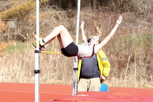 ALLEE PURCELL, a junior, scored 15 points for the Warriors in their victory against Burlington. Purcell cleared 4’11” to win the high jump. The junior also ran a first place time of 12.7 seconds in the 100 and posted a PR time of 60.2 seconds for first in the 400. (Donna Larsson File Photo)