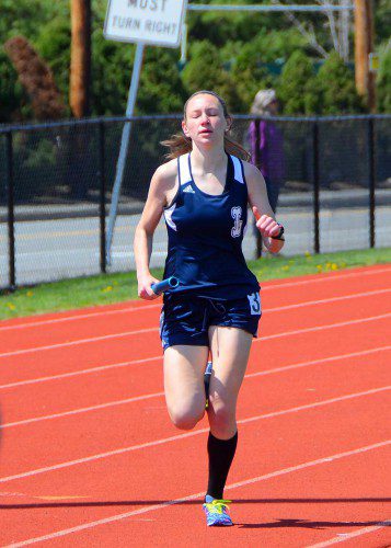 KATE MITCHELL won the mile race in the meet against both Masconomet and Pentucket last week with a time of 5:19.96. She has also been a strong contributor to the relay teams this season. (John Friberg Photo)