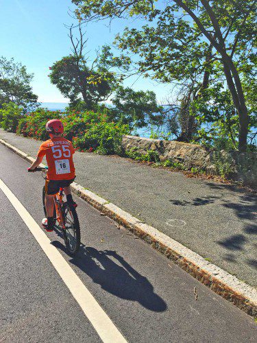 TWELVE-YEAR-OLD Kevin Connolly wore an orange T-shirt he helped create in memory of his late friend Sonny Tropeano during the 13th annual Reid’s Ride on Sunday. The Always Sonny team, compromised of Kevin and his father Steven, raised over $1,800 in Tropeano’s memory.  (Courtesy Photo)